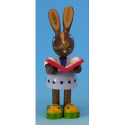 Osterhasenmädchen mit Buch