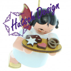 Engel schwebend mit Lebkuchenblech, rote Flügel