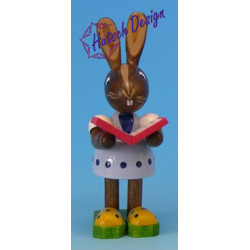 Osterhasenmädchen mit Buch