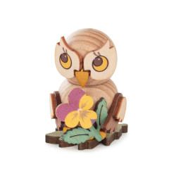 Eulenkind mit Blume