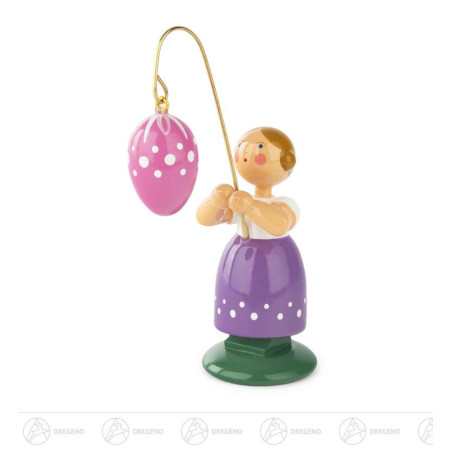 Ostermädchen mit rosa Ei