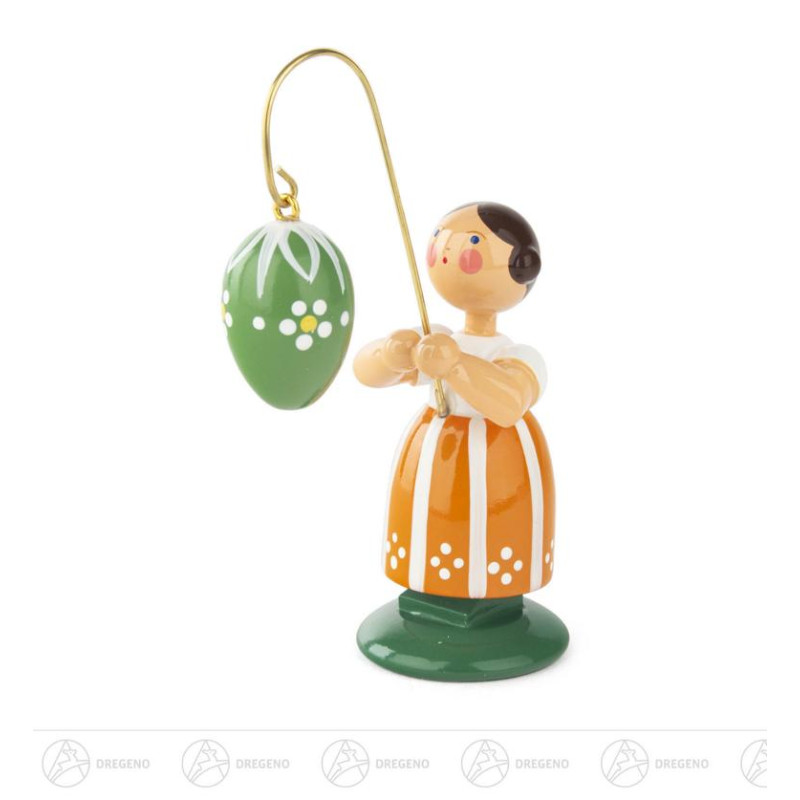 Ostermädchen mit grünem Ei