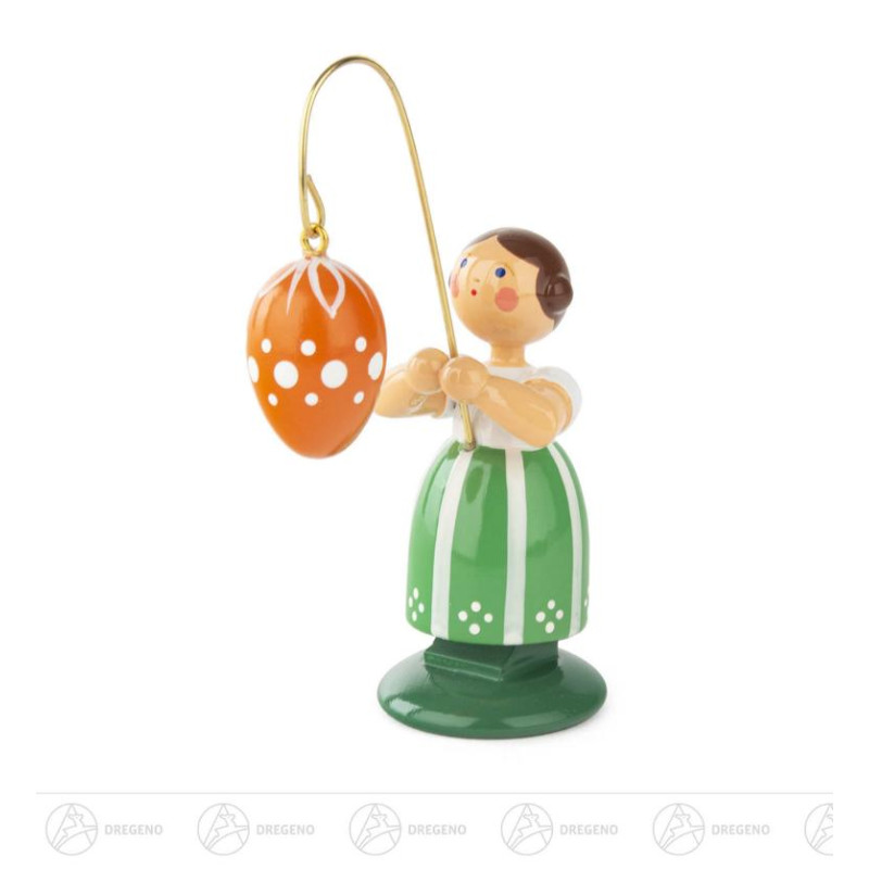 Ostermädchen mit orangem Ei