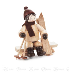 Skifahrer auf Bank natur